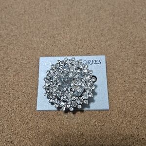 Silver rhinestone brooch